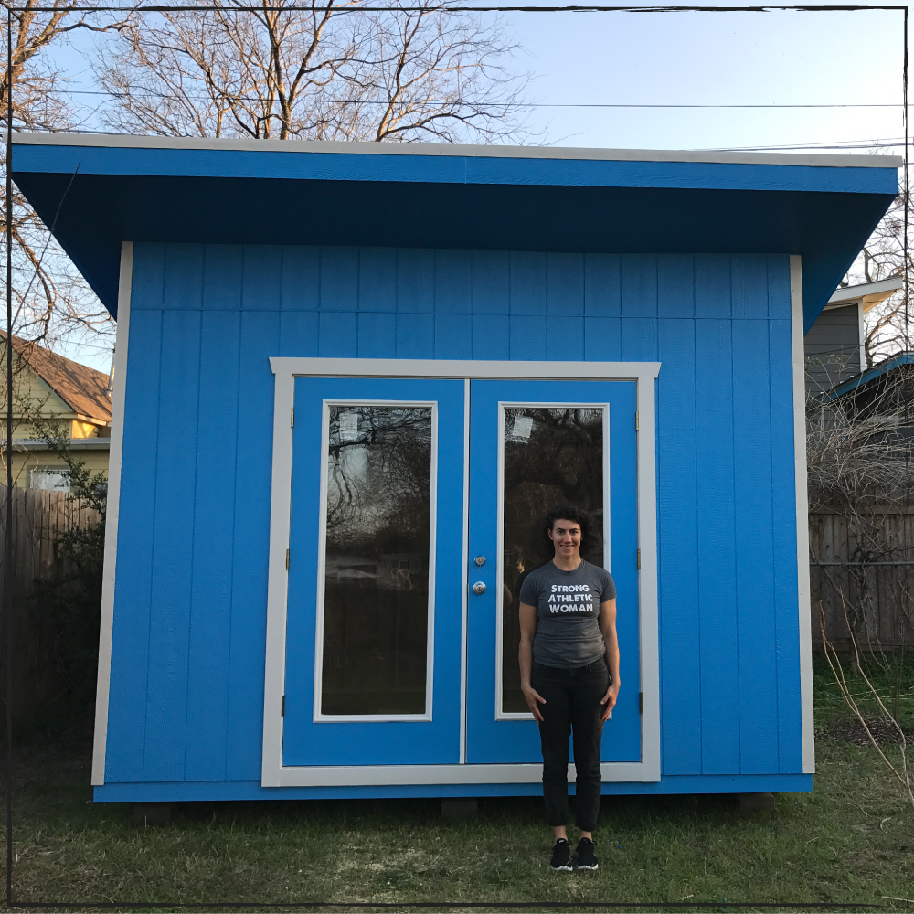 This is the original "warehouse" for Strong Athletic, in the backyard of our founder's house. This photo was taken in 2017. Nadia's wearing the original Strong Athletic Woman shirt in this photo. 